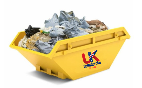 General Waste Skip A yellow skip filled with general waste materials and debris.