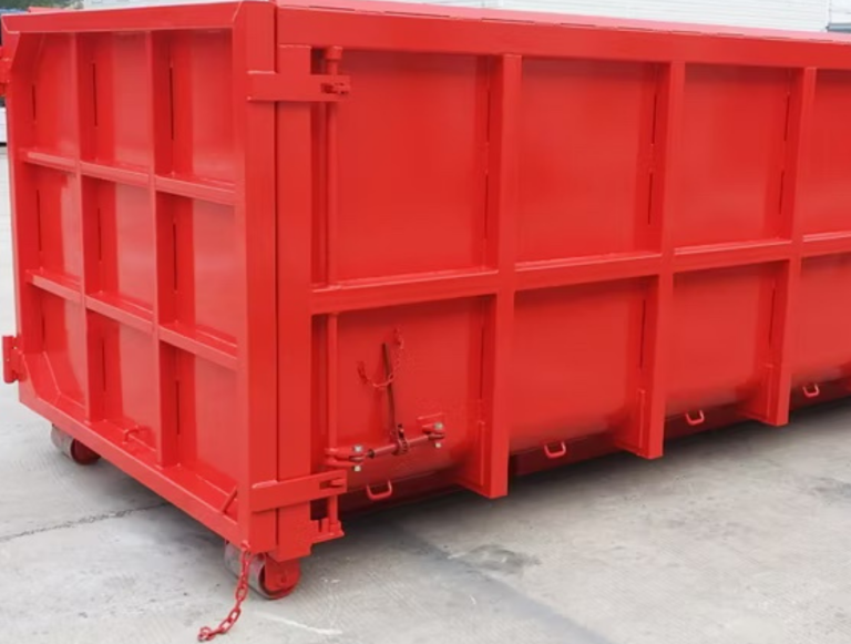 Bright red waste container with a rectangular shape and metal locking mechanism.